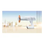 Woodpecker Ai Ray — portable X-ray unit and orange shield on a tabletop