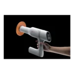 Woodpecker Ai Ray — hand-held view showing the rear control display