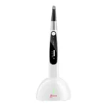 Woodpecker EndoMatic — front view of the handpiece seated in its white base