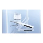 Woodpecker Endo Pace — handpiece displayed beside its charging cradle
