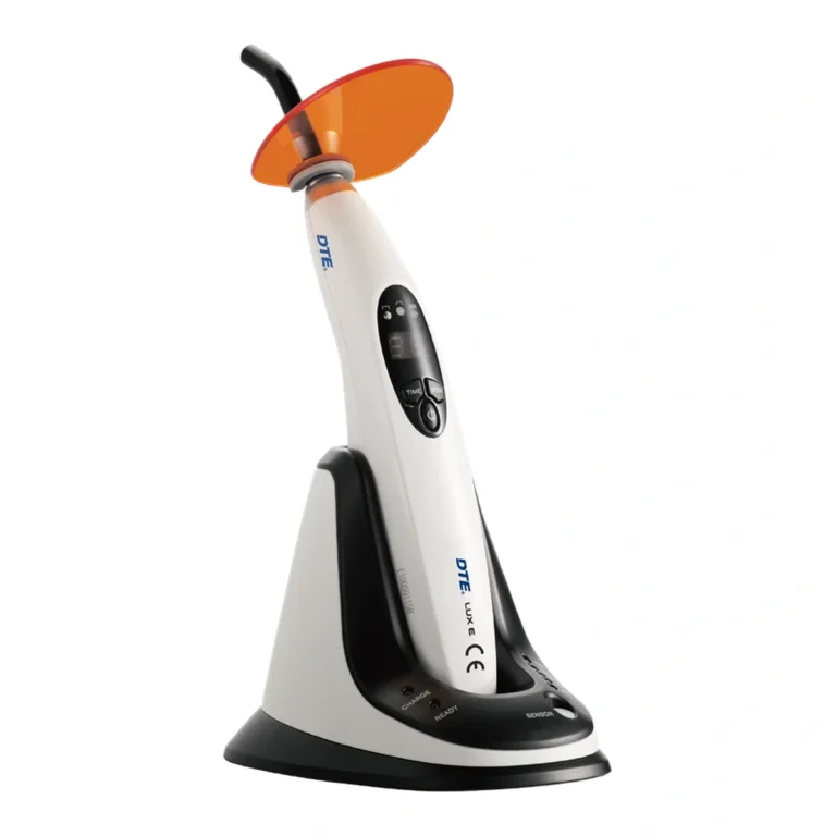 DTE LUX E Plus — curing light and orange shield on a black charging base